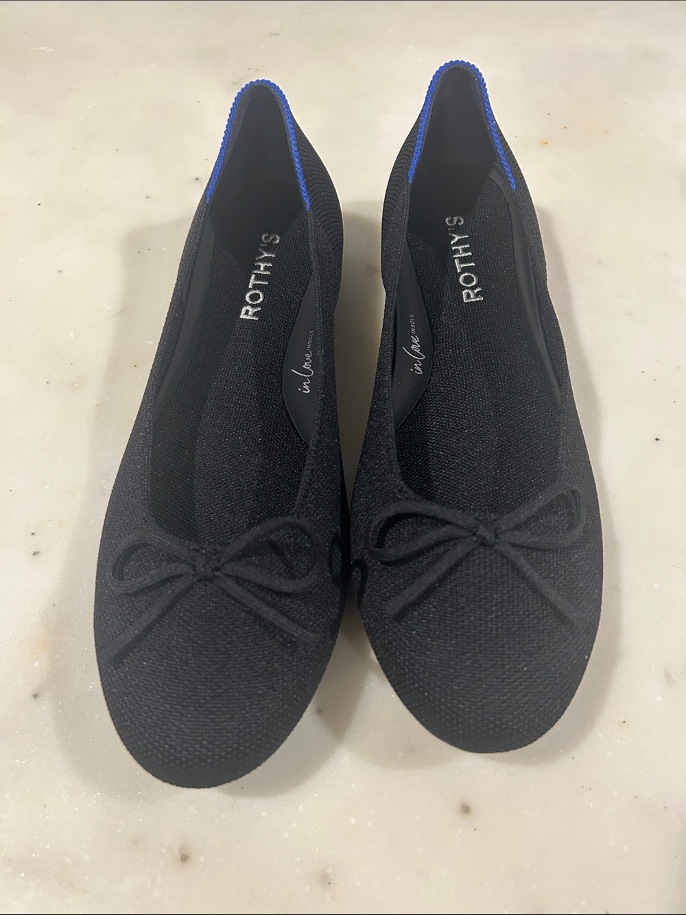 Rothy's Black Ballet Flats with Blue Trim